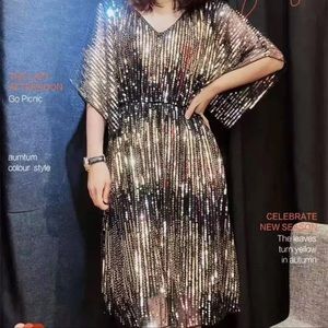 Gold and black sequin party dress